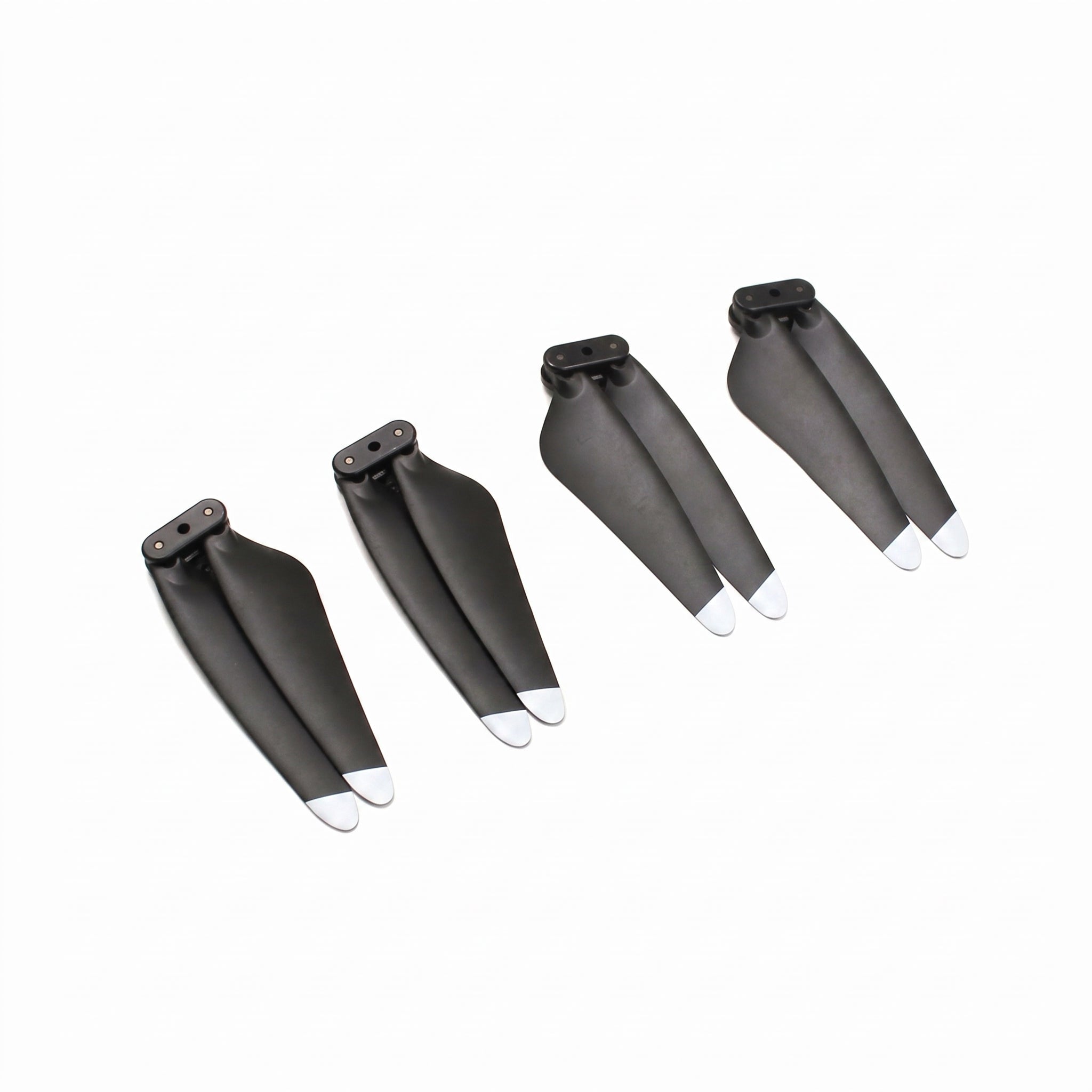 Four black LIMITLESS 5 drone propellers with white tips arranged diagonally on a plain white background.