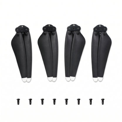 Four black LIMITLESS 5 drone propeller blades with white tips and four small black screws, arranged on a plain white background.